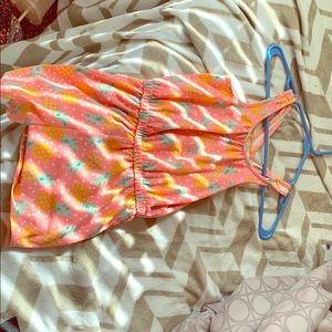 A pineapple romper cooler